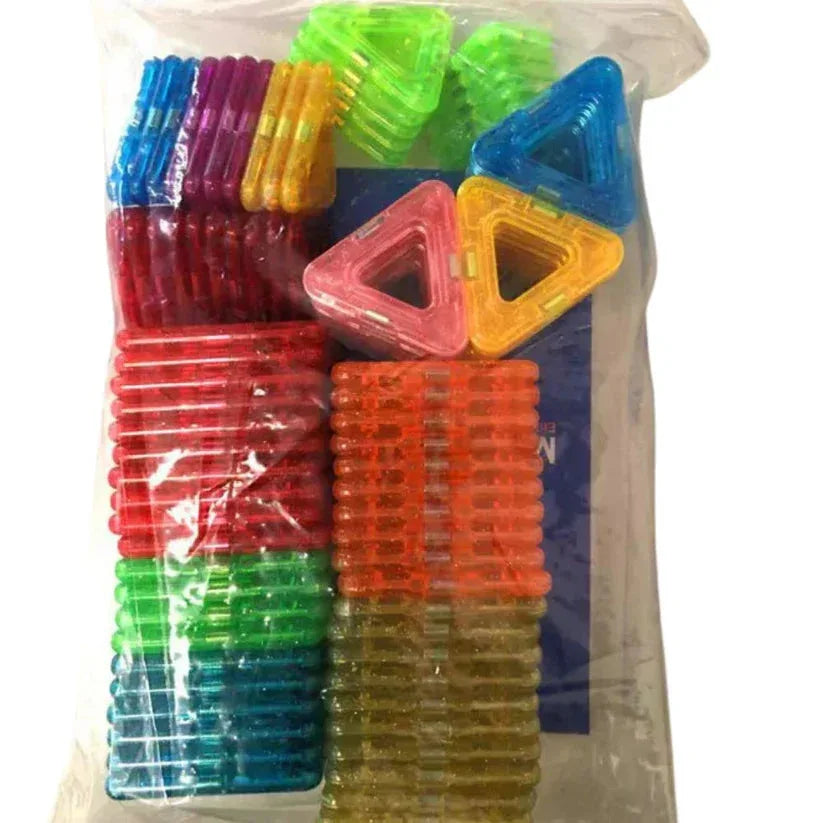 Colorful plastic building blocks in a clear bag on a white background