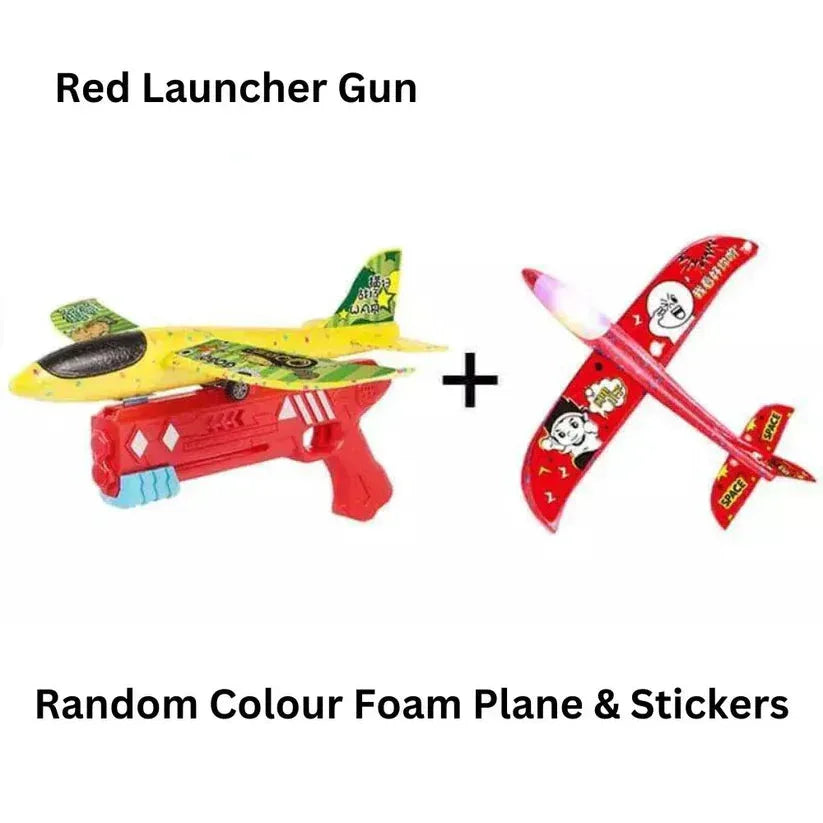 Red launcher gun with a foam plane and stickers on a white background
