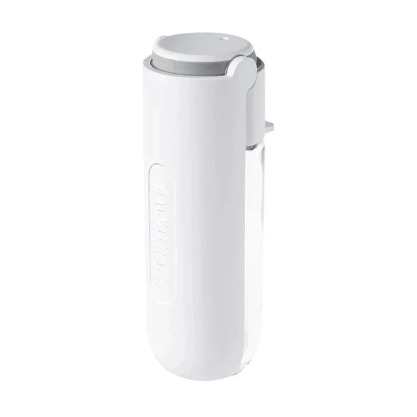 White handheld device with a gray top on a white background