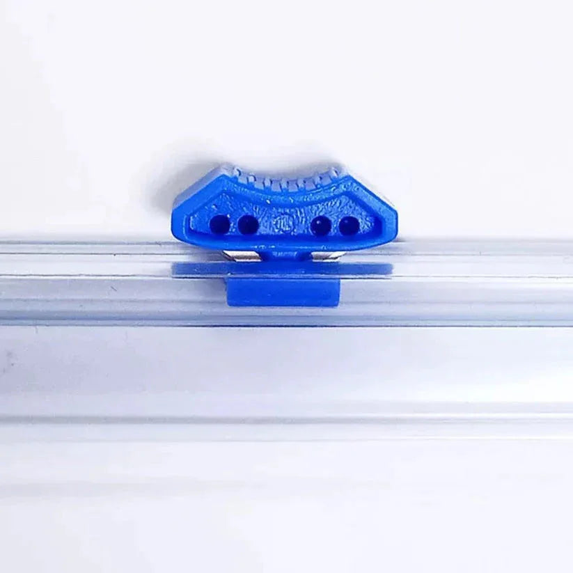 Blue plastic clip on a white background