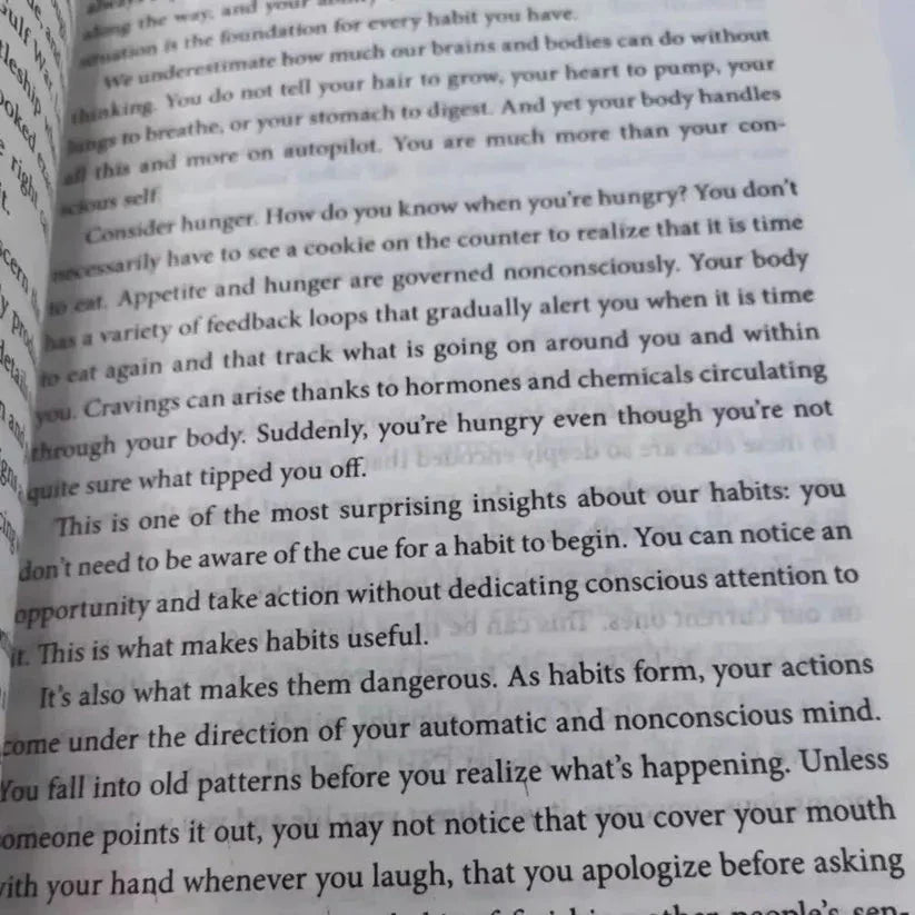 Open book with text on a white background