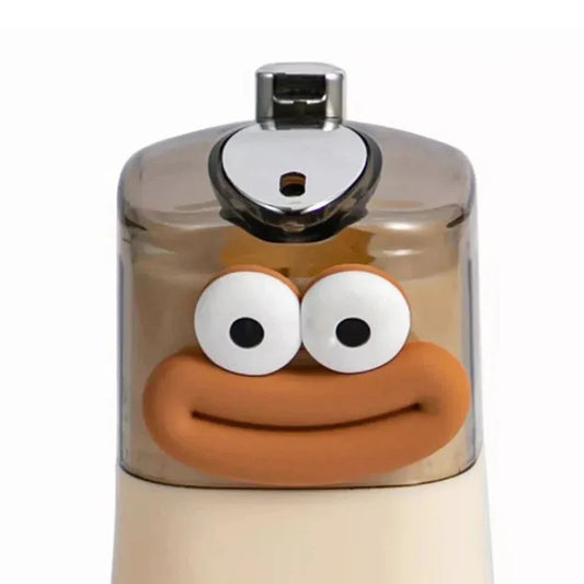 Perfume bottle with a face design on a white background