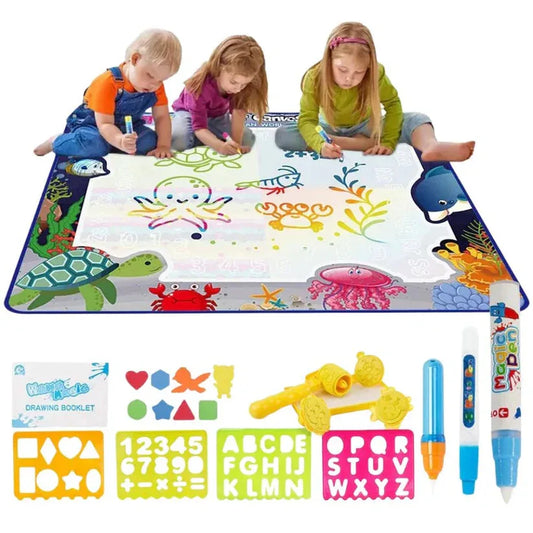 Children drawing on a colorful mat with markers and toys.