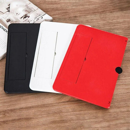 Black, white, and red tablet cases on a wooden surface