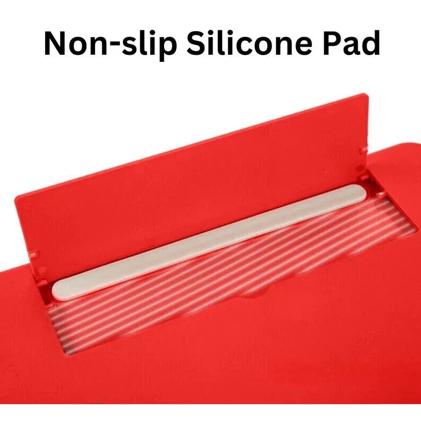 Red non-slip silicone pad with a white stick on a white background