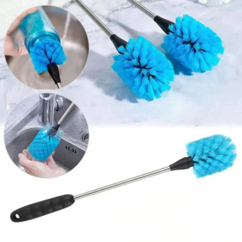 Cleaning brushes with blue bristles on black handles, used to clean a sink.