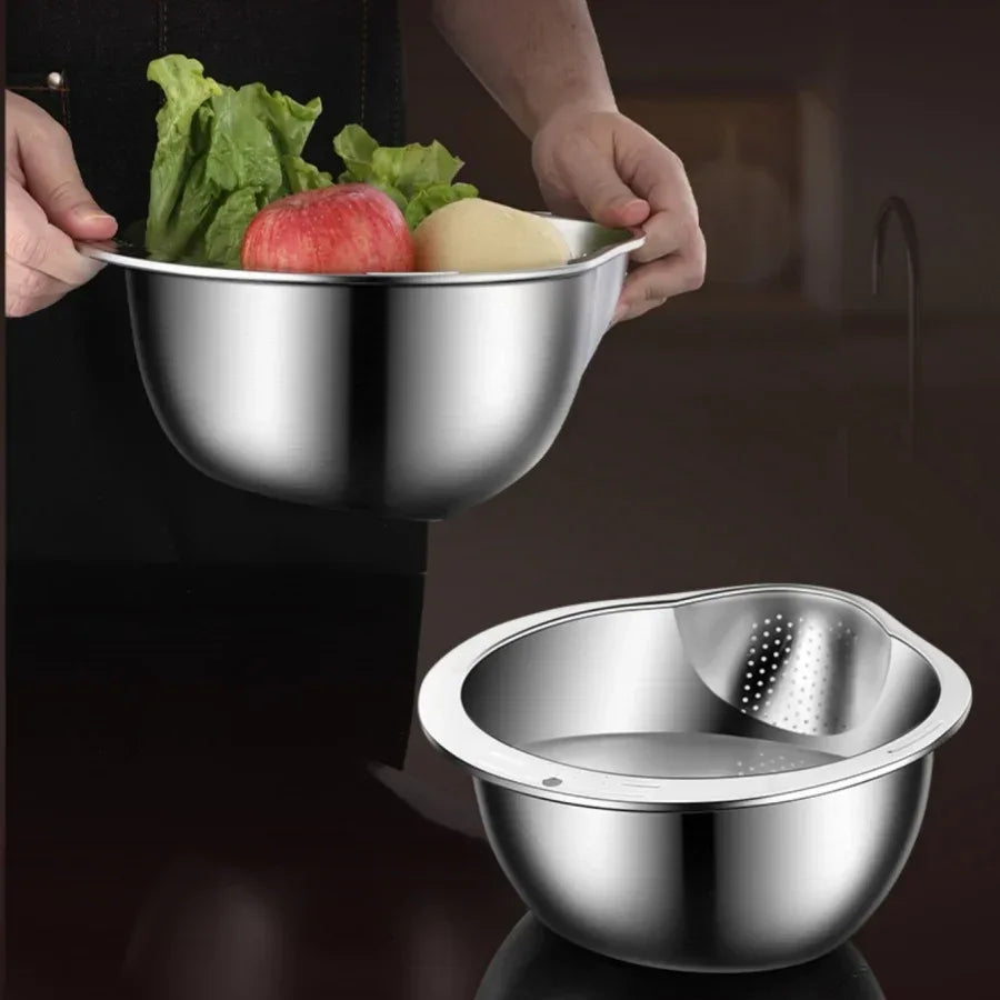 Stainless steel mixing bowl with vegetables held by hands, and another empty bowl on a dark background.