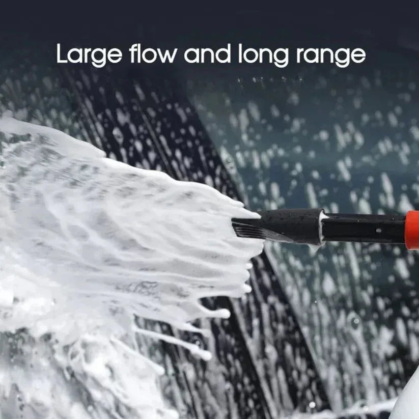 Foam being sprayed onto a car windshield with text 'Large flow and long range'.

