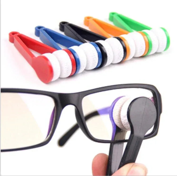 Set of colorful eyeglass cleaning tools with a black frame glasses on a white background

