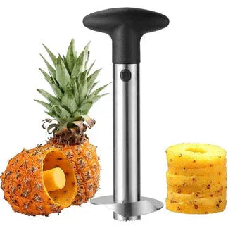Pineapple peeler with a whole pineapple and peeled sections on a white background

