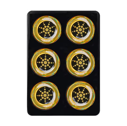 Set of six gold and black circular objects on a black card

