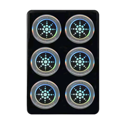 Set of six holographic stickers with star-like designs on a black card.

