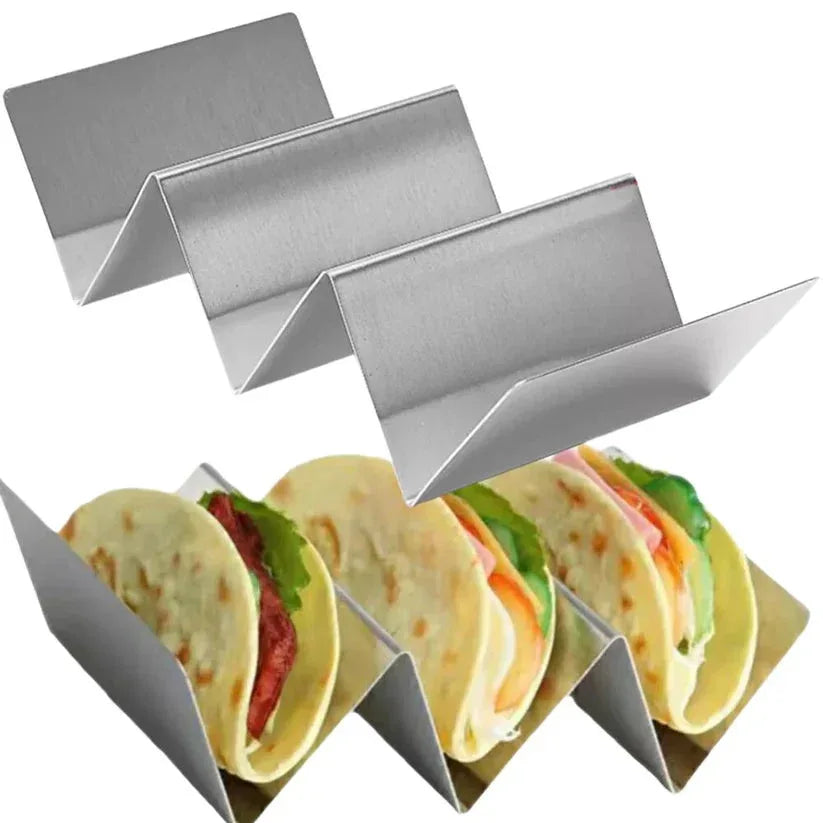 Metal taco holders with tortillas and fillings on a white background

