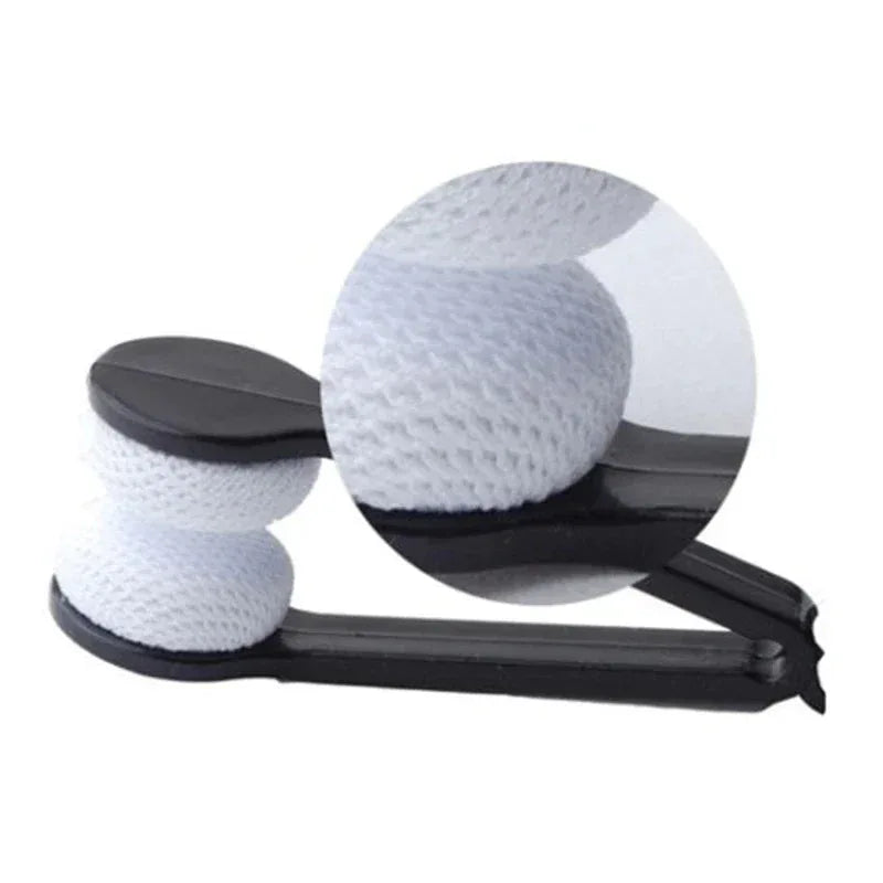 Massage roller with white textured balls on a black base

