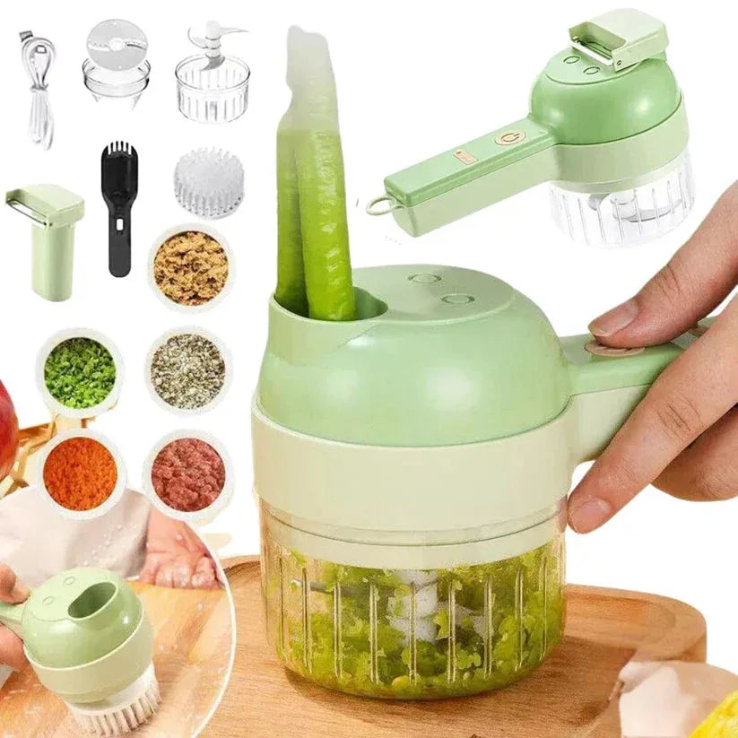 Green kitchen chopper with attachments on a wooden board, surrounded by ingredients and additional attachments.

