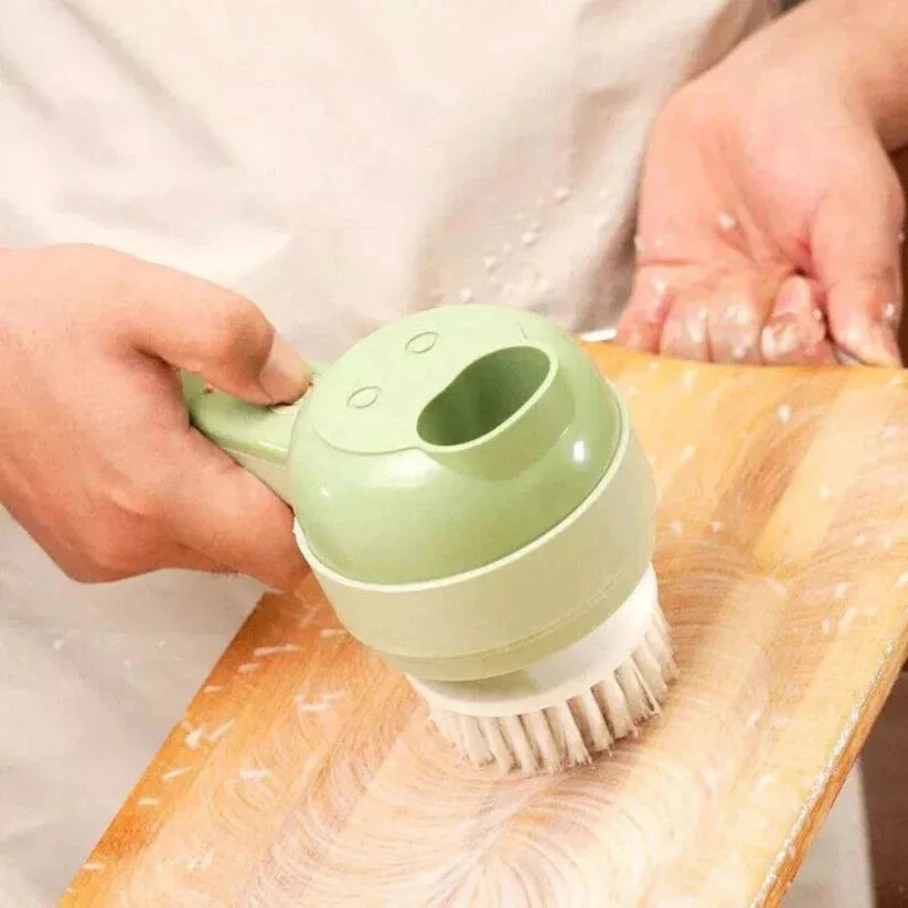 Green kitchen scrubber being used on a wooden cutting board.

