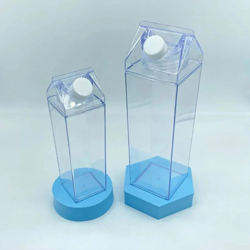 Two clear plastic boxes with blue bases on a light gray background

