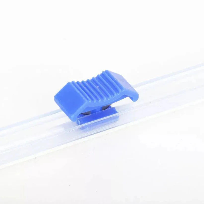 Blue plastic clip on a white background

