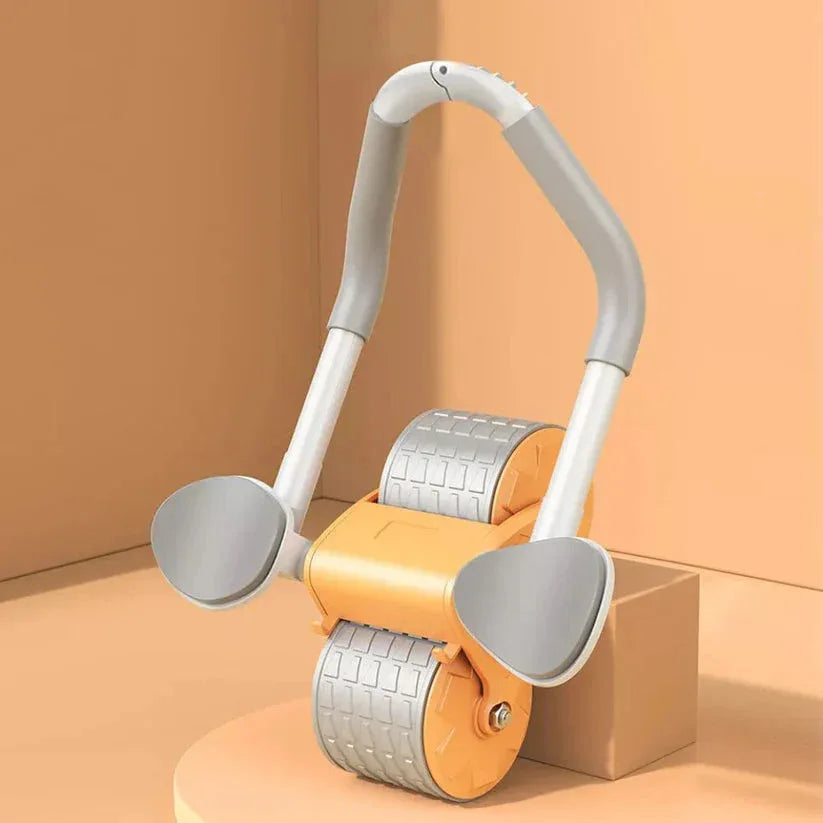 Orange and gray exercise roller on a beige background

