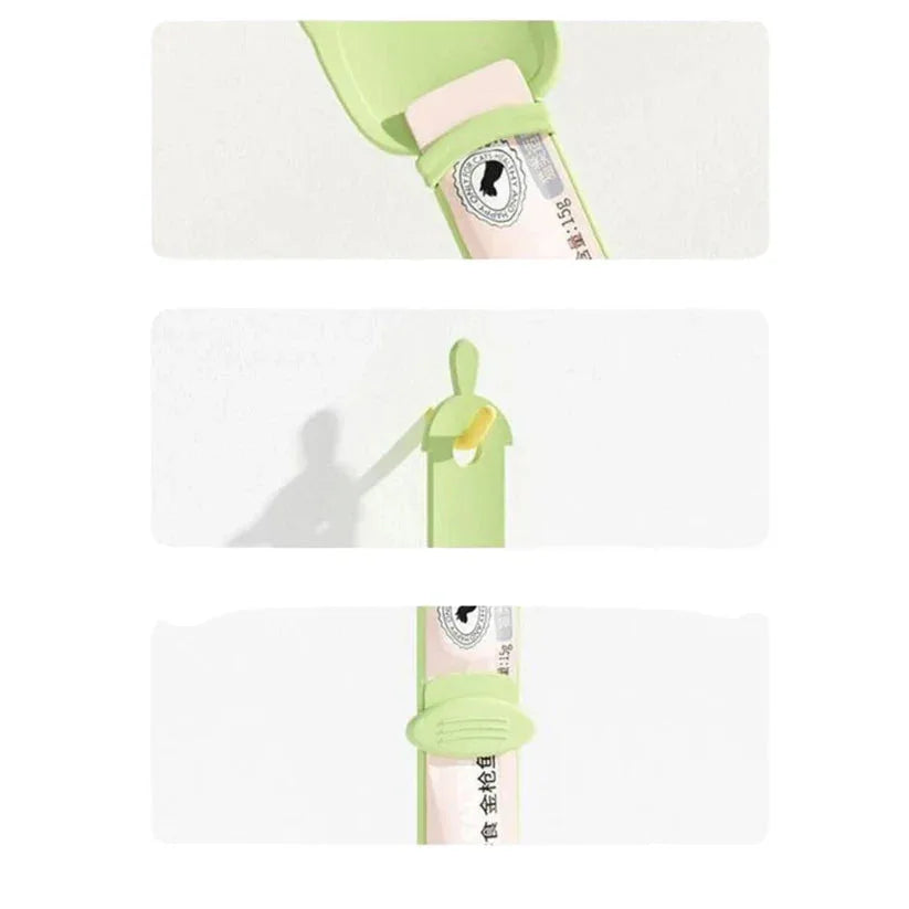 Green baby bib with a brand logo on a white background


