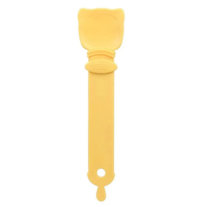 Yellow spatula with a flexible head on a white background

