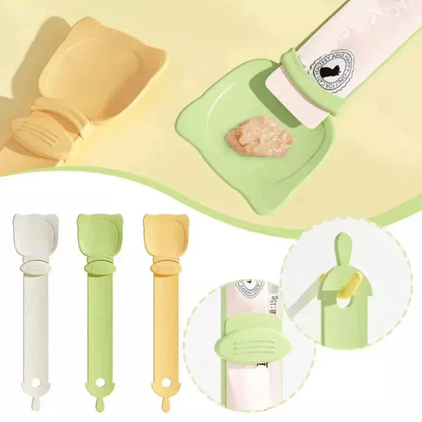 Set of baby feeding utensils including a spoon, spatula, and bib on a yellow background.

