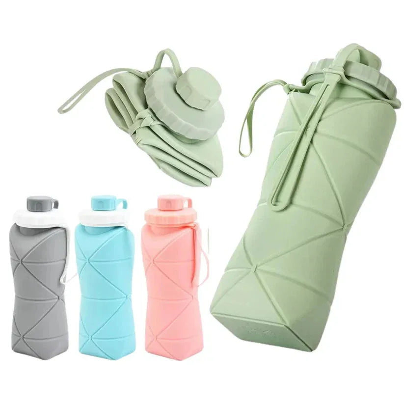Set of collapsible water bottles in gray, blue, and pink with a green folded bottle on a white background.


