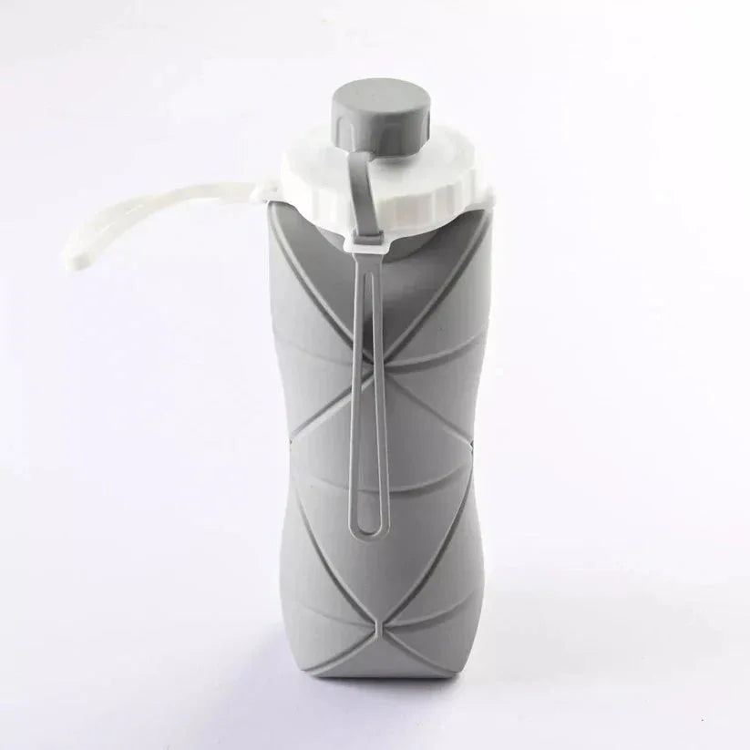 Collapsible gray water bottle on a white background

