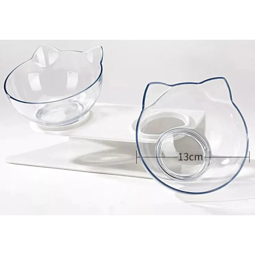 Two clear glass bowls shaped like cats' heads on a white background with one bowl labeled 13cm.

