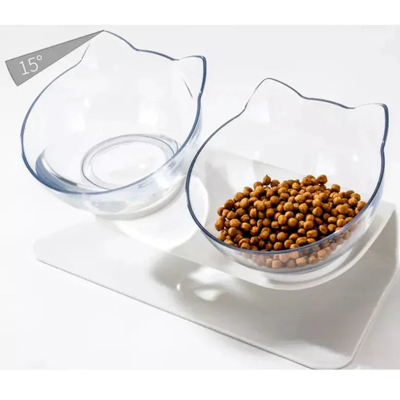 Cat-shaped clear bowl with pet food on a white background

