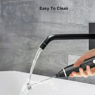 Black faucet being cleaned with a brush under running water, with 'Easy To Clean' text above.

