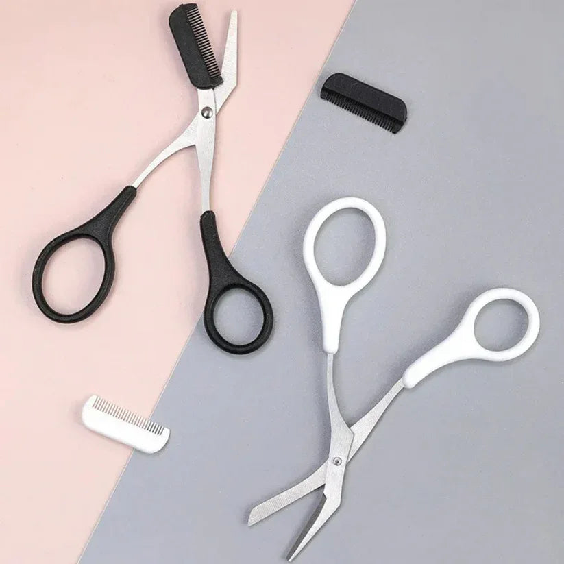 Set of scissors and combs on a gray and pink gradient background

