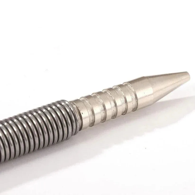 Metallic pen with a pointed tip on a white background

