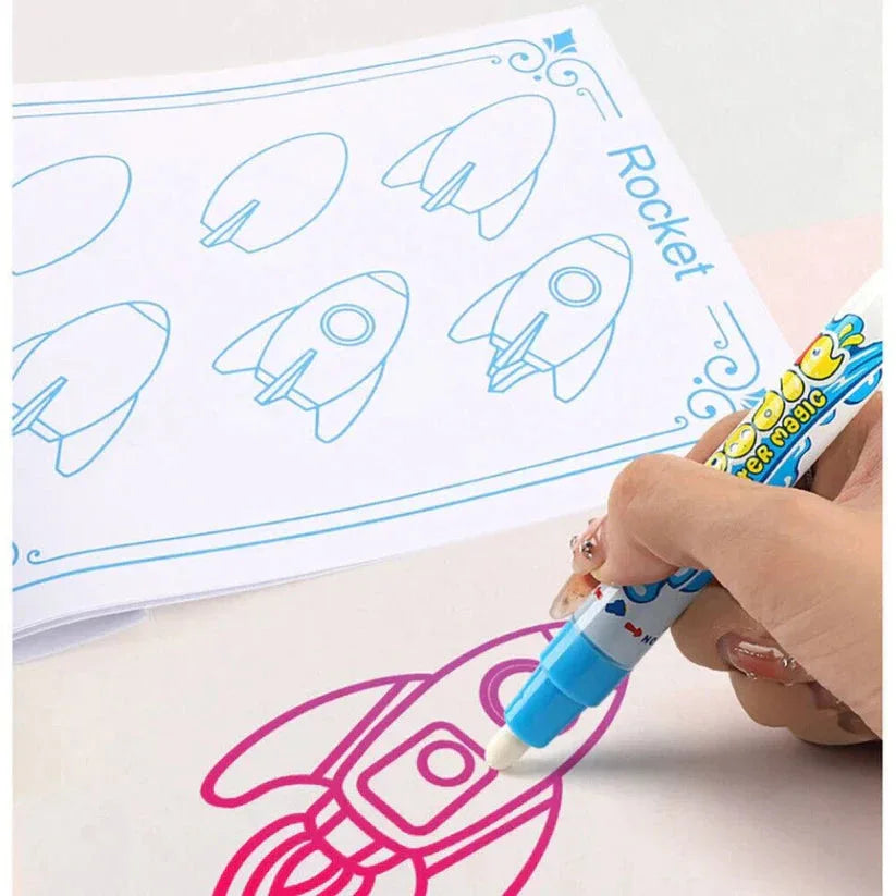 Hand drawing a rocket on a coloring book with a marker

