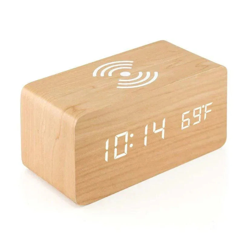 Wooden digital clock with LED display on a white background

