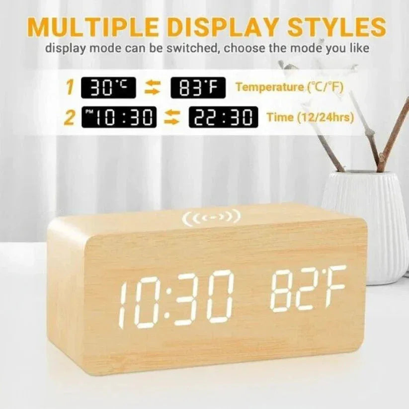 Wooden digital clock with LED display showing time and temperature, on a white background.

