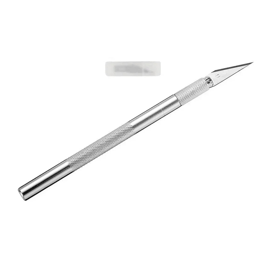 Metal craft knife with a white background


