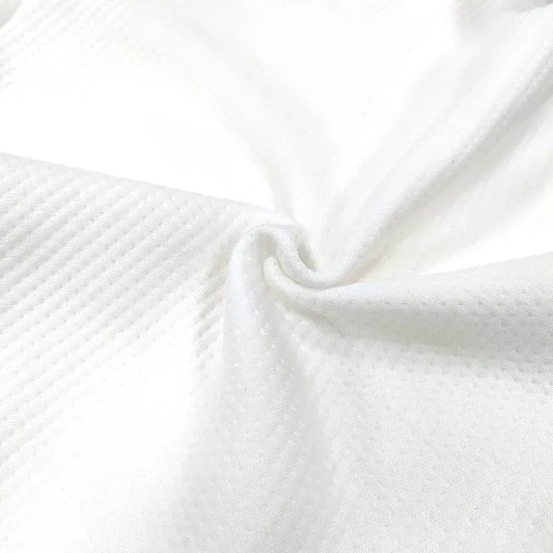 Close-up of white textured fabric

