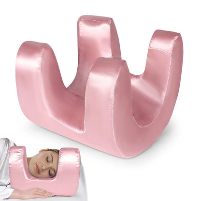 Pink inflatable neck pillow with a woman using it on a white background

