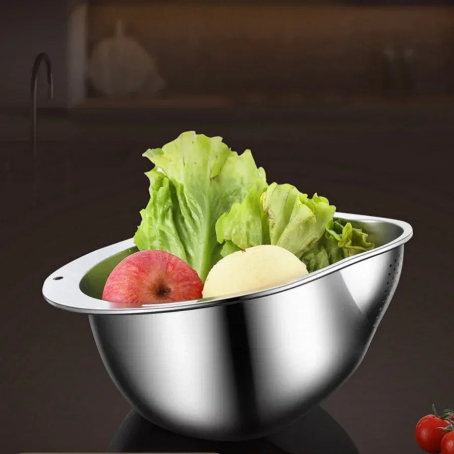 Metallic colander with vegetables on a dark background

