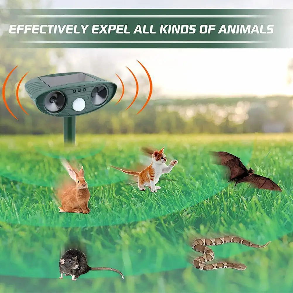 Solar-powered animal repeller device with animals being repelled in a grassy field.


