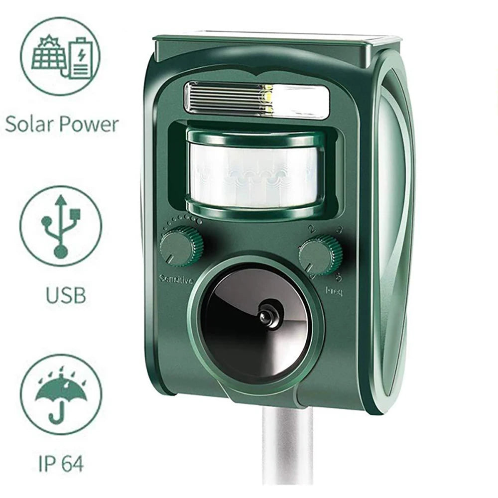 Green outdoor security camera with solar power, USB, and IP 64 features on a white background.

