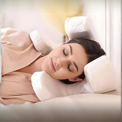 Woman sleeping peacefully on a pillow with a soft, blurred background

