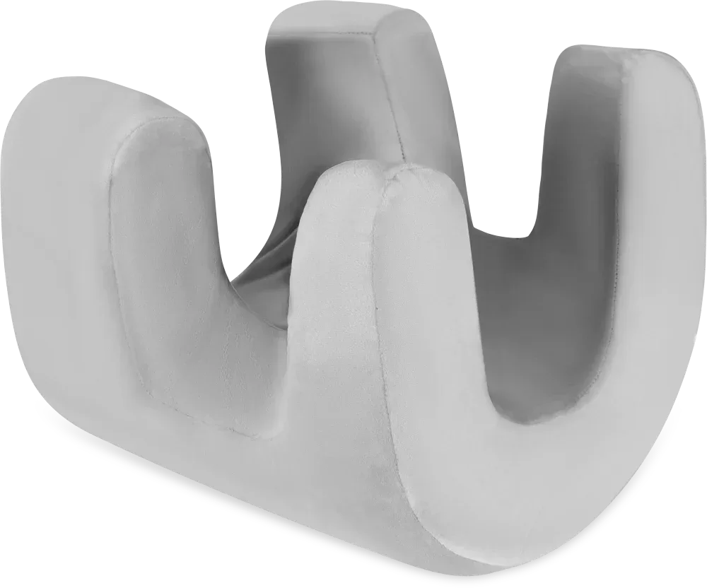 Gray rubber duck-shaped bath toy on a white background

