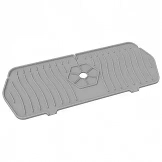Gray plastic mat with a central hole on a white background

