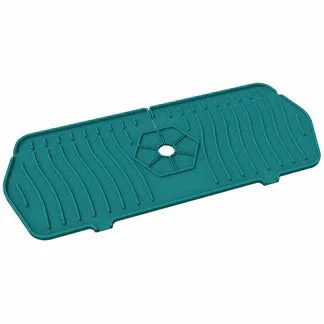 Teal plastic mat with a central hole on a white background

