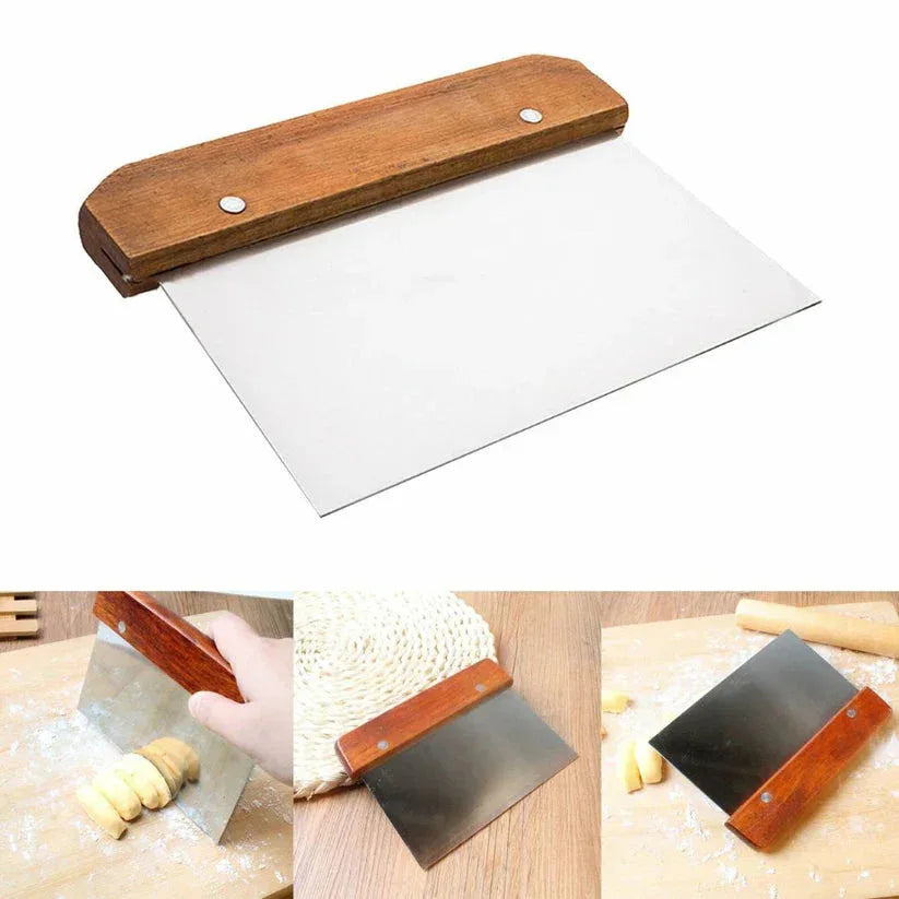 Wooden scraper with a white blade on a white background, used for dough preparation.

