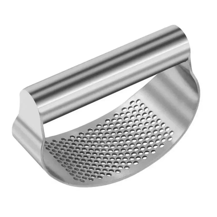 Metal garlic press on a white background

