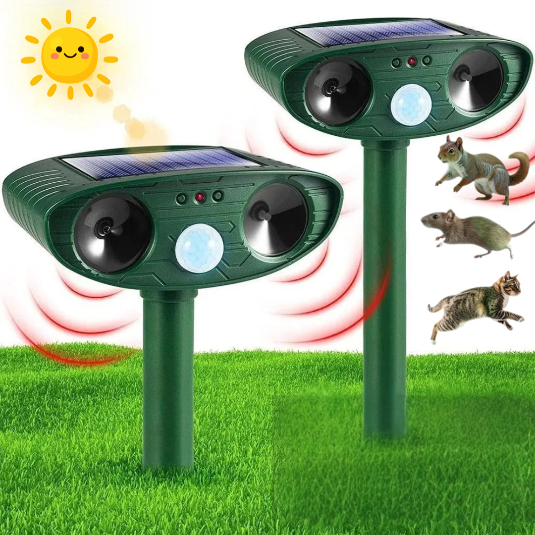 Two solar-powered pest deterrent devices on grass with a sun icon above them.


