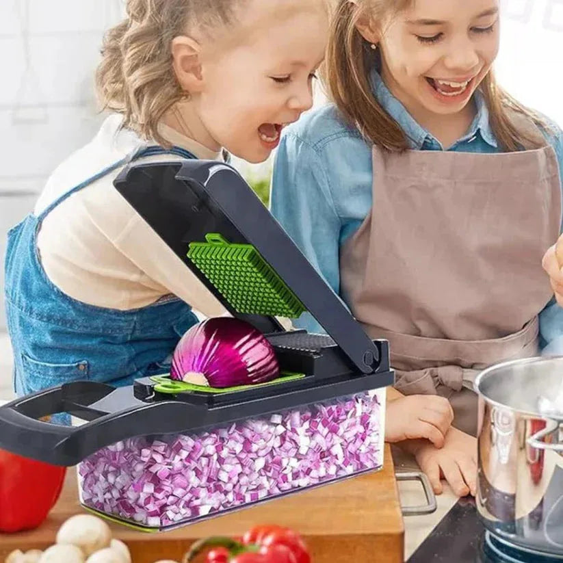 Two children using a vegetable chopper with chopped onions on a kitchen counter.

